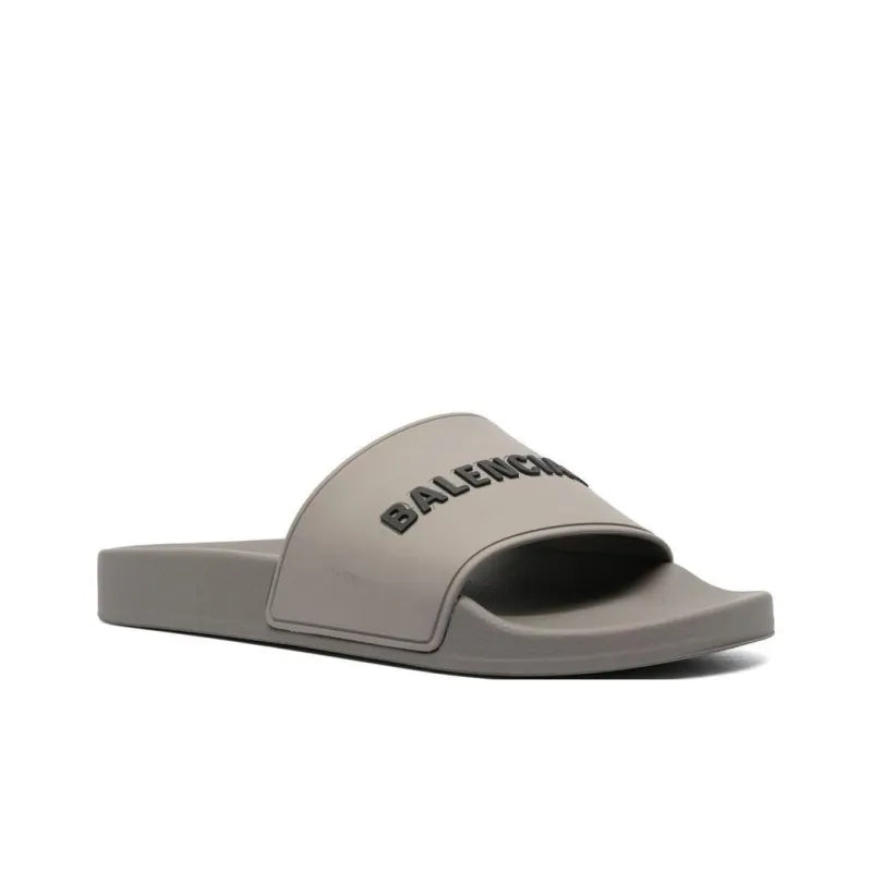 Balenciaga logo-embossed pool slides
