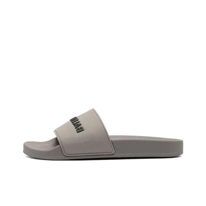 Balenciaga logo-embossed pool slides