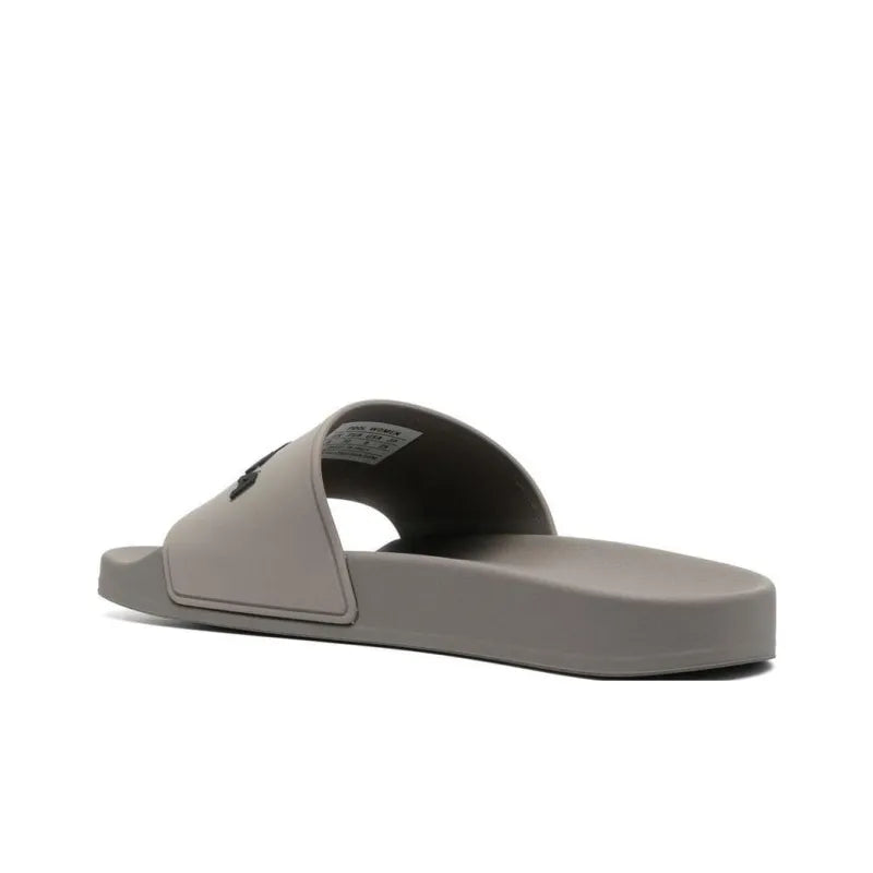 Balenciaga logo-embossed pool slides